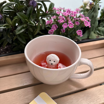 Tasse mit Figur