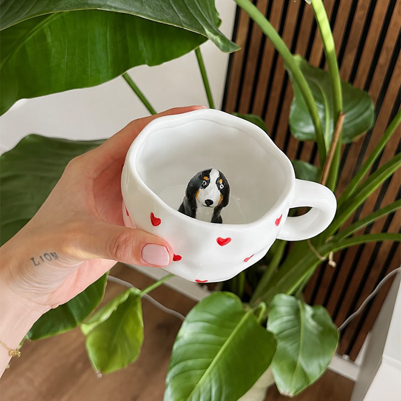 Tasse mit Figur