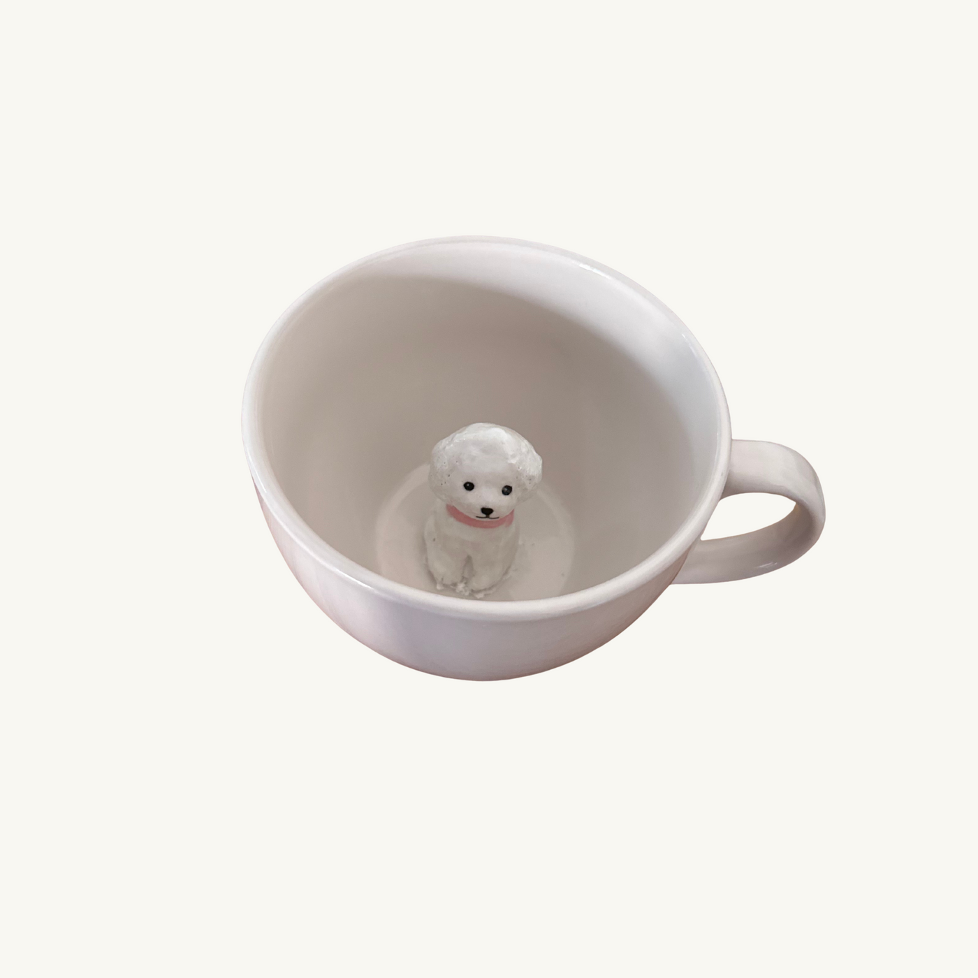 Tasse mit Figur
